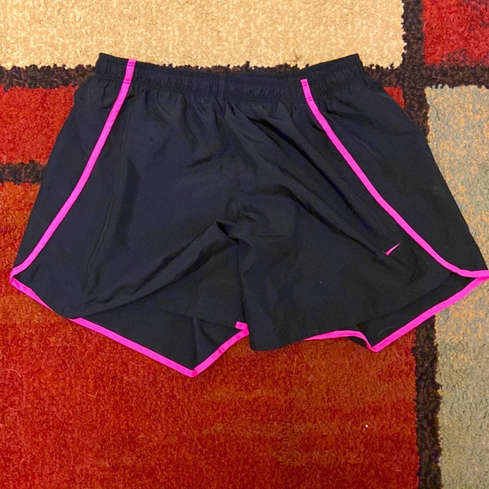 Two pairs, size XL juniors Nike shorts